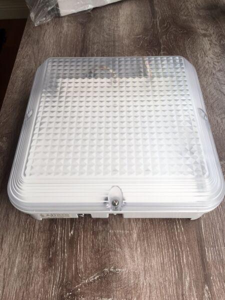 LED light with built in microwave sensor