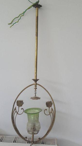Gorgeous pendant in antique brass finish with floral detail