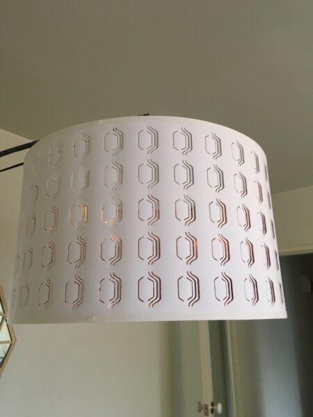 White and metallic IKEA lampshades