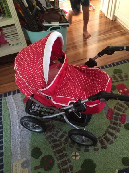 Baby pram (comes with the doll and matched baby bag)
