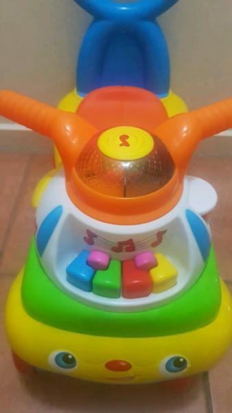 FISHER PRICE RIDE ON CAR