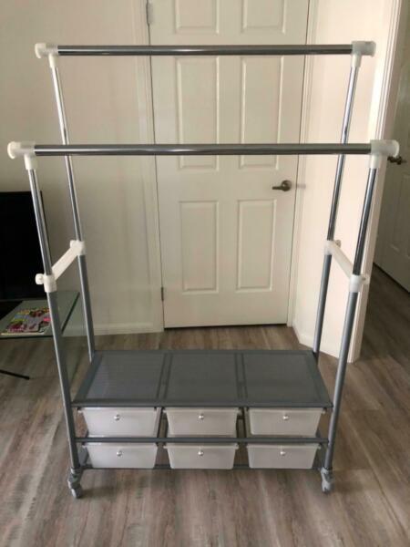 Clothes rack with 6 drawers - as new $60