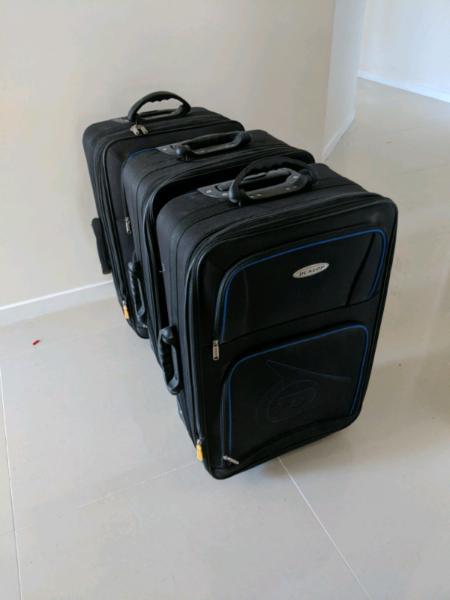Suitcases x 3