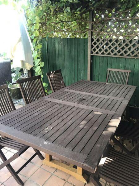 Large solid wood outdoor table & 7 chairs