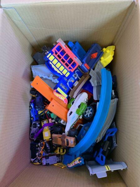Box of kids toys cars and track