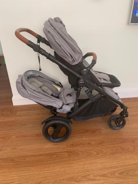 Strider compact deluxe double pram with 2nd seat