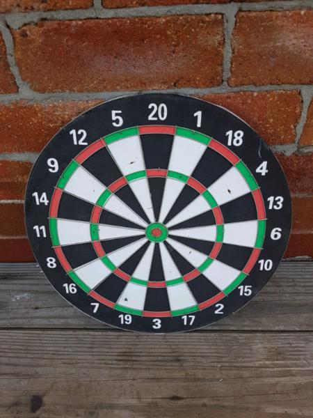 Lightweight slim dart board in good condition