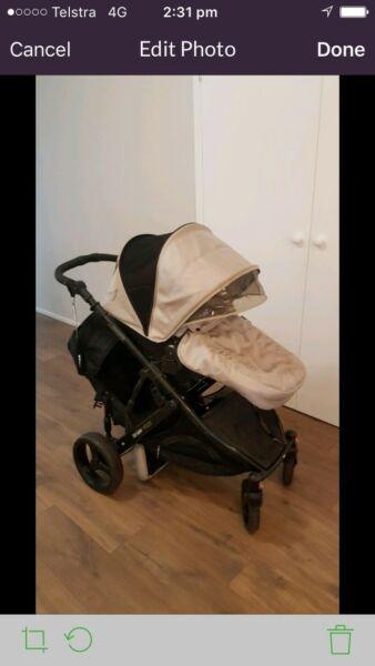 Strider plus pram with second seat, sun shade and rain cover