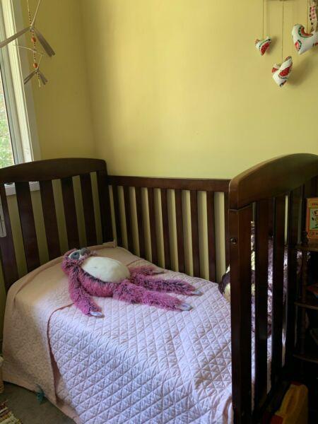Dark wooden cot/toddler bed AND mattress