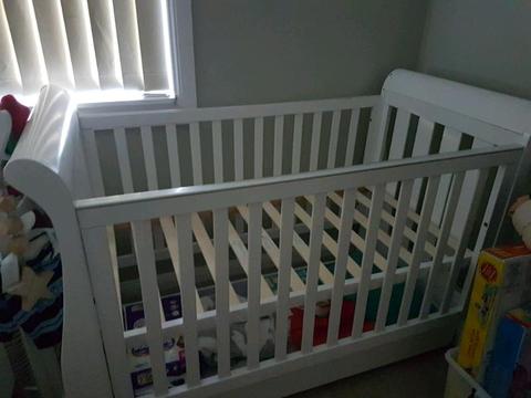 White timber sleigh cot