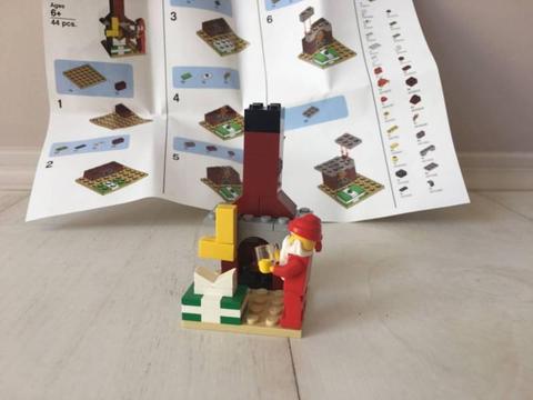 Lego Christmas Santa at fireplace