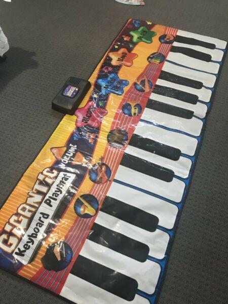 Gigantic keyboard playmat