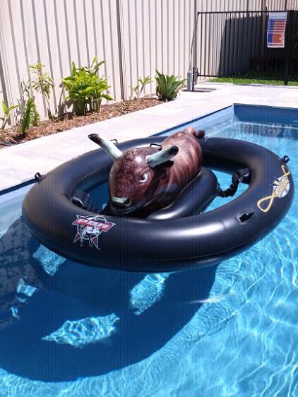Inflatable pool toy - bull riding challenge