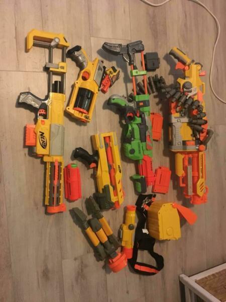 Nerf Guns assorted with miscellaneous accessories
