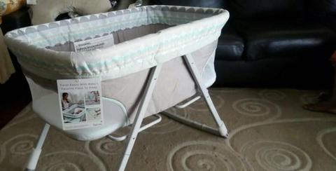 Near new Ingenuity foldaway rocking bassinet for sale