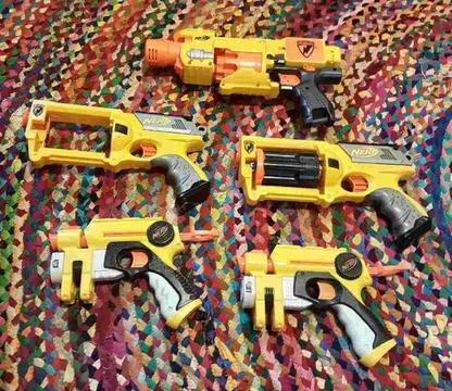 Set of 4 original nerf blasters with spare part