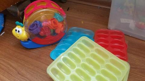 Fisher price shape sorter and baby food freezer trays