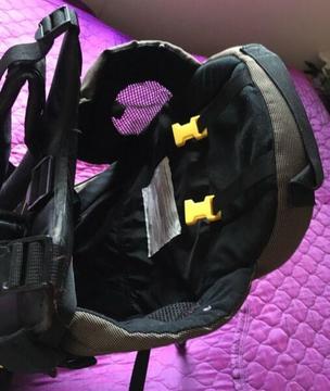 Snuggli child carrier seat in one