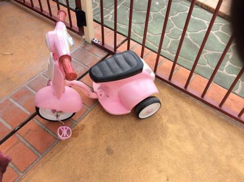 Child's peddle bike tricycle pink