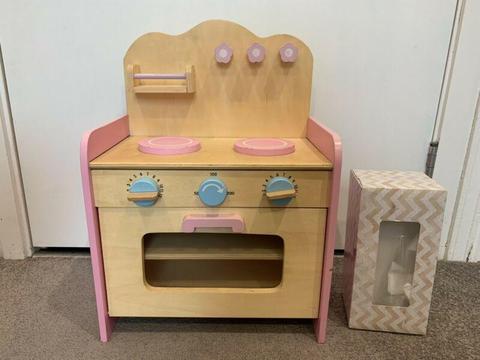 Small wooden pink play kitchen