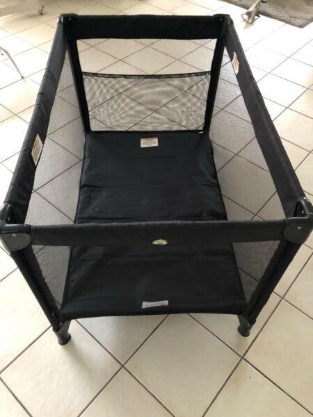 Porta cot with bassinet attachment. Barely used