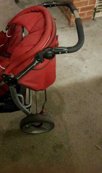 Red baby pram in excellent condition
