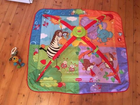 Tiny love baby play mat with toy attachments and music