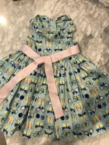 Baby girl's party dress with pink ribbon belt