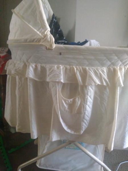 White bassinet with storage