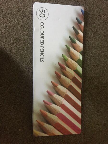 New tin of colouring in pencils