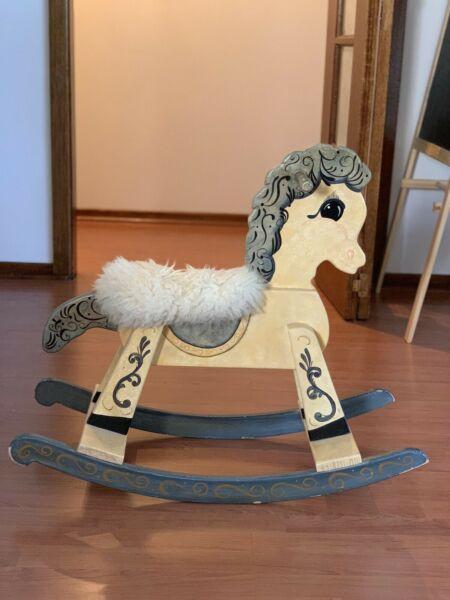 Selling wooden rocking horse