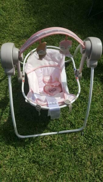 baby swing powered with music