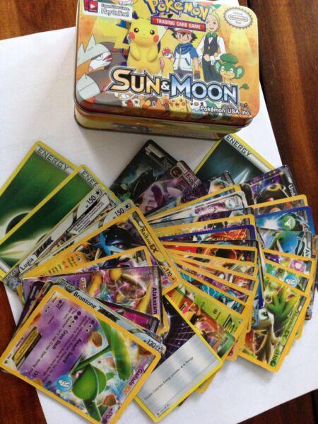 Pokemon sun and moon tin and 50 trading cards