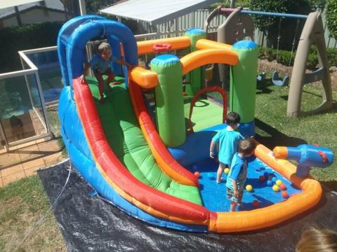 Childrens jumping castle with slide