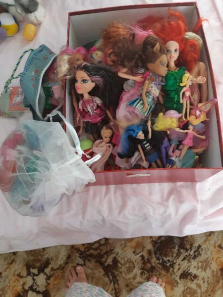 Barbies , clothes and accessories