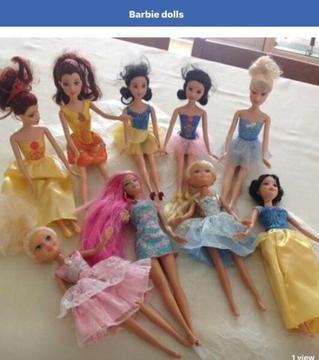 Assortment of barbie dolls