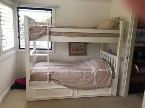 White solid wooden bunks with trundle in decent shape