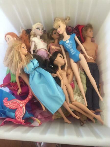 Box of Barbie dolls