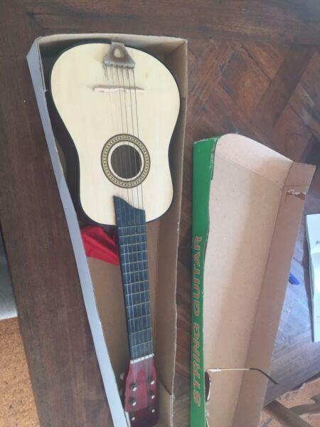 Small guitar and kids books