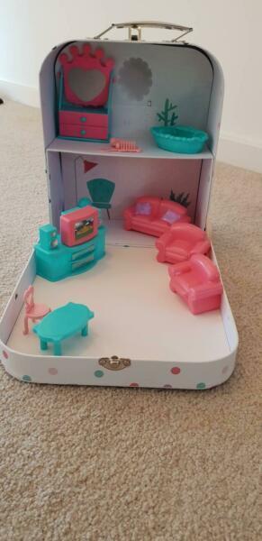 Toy suitcase with doll furniture