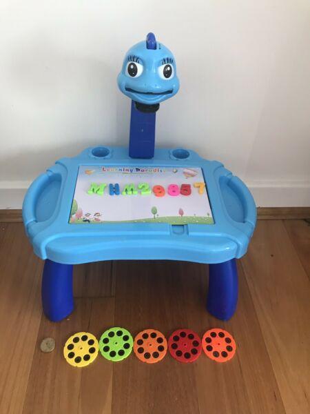 Magnetic alphabet kids table with projector