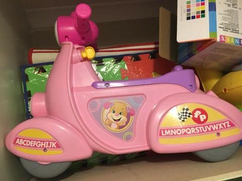 Fisher Price Laugh and Learn Smart Stages Scooter Pink