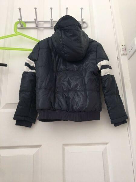 Size 8 boy milkshake winter jacket. Brand new in tag!