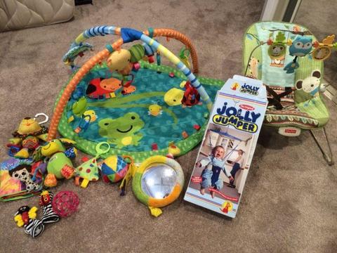 Playmat, toys, bouncer and jolly jumper
