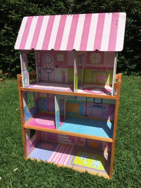 Wooden quality dolls house and bonus free furniture