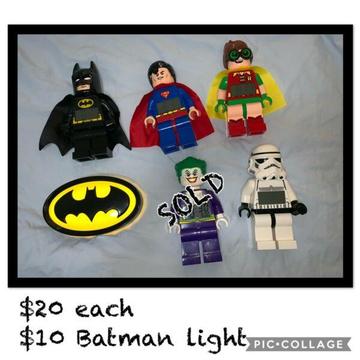 LEGO clocks Batman, Superman, Robin, StormTrooper, WonderWoman