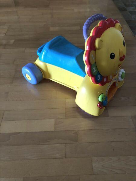 Fisher price Lion scooter