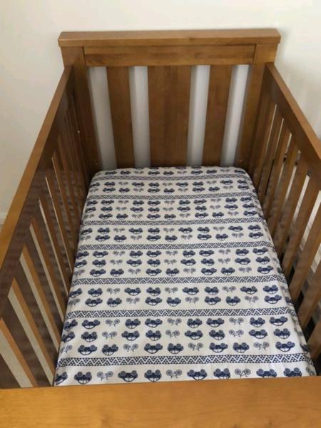 Solid timber Cot bed in good condition