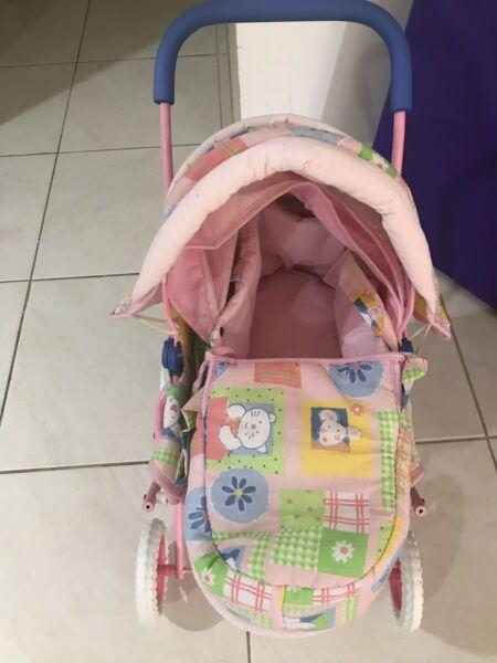 Doll /baby pram 4 wheel with carry basket