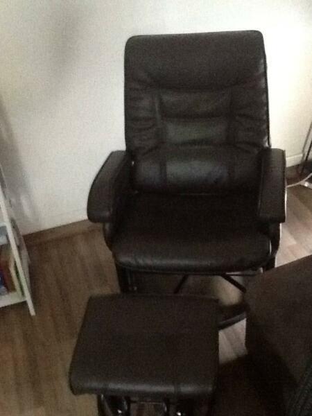 brown leather reclining feeding chair with rocking foot stool
